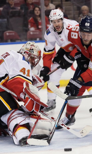 Trocheck’s shootout goal lifts Panthers over Flames 3-2